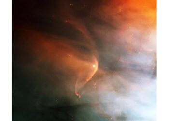 Infrared image of the shockwave (red arc) created by the massive giant star Zeta Ophiuchi in an interstellar dust cloud. The tenuous winds of sun-like main-sequence stars are much more difficult to observe