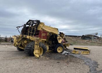 Combine thrown by tornado