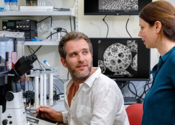 Yoel Goldstein and Ofra Benny in the Lab