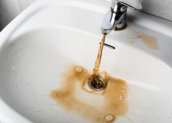 Dirty water running into sink