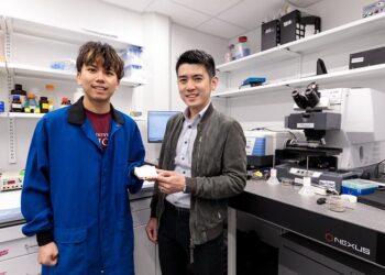 Spectrally engineered textile for radiative cooling against urban heat islands