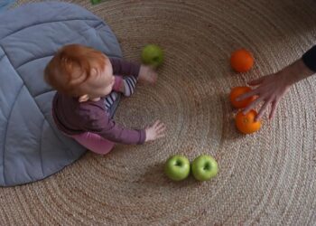 Baby learning words and numbers through play