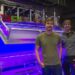 Postdoctoral researcher David Stupski, left, and Assistant Professor Floris van Breugel stand in front of a wind tunnel at the University of Nevada, Reno.