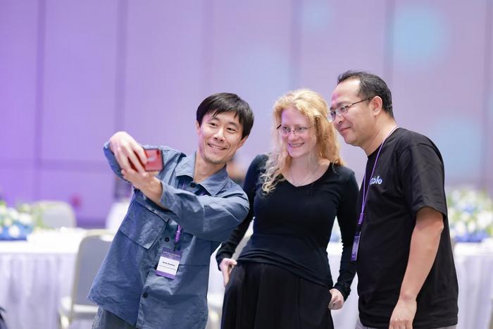 Conference Attendees Taking a Selfie