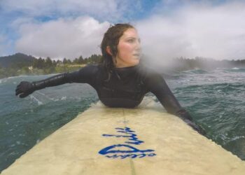 Surfer off the Oregon coast