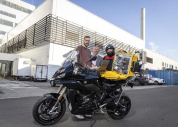 Part of the project team with the measuring device for motorcycles