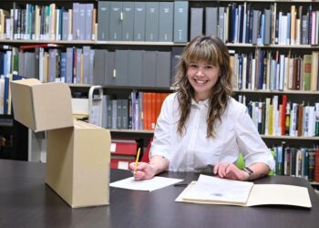 UNF student working in Library archives