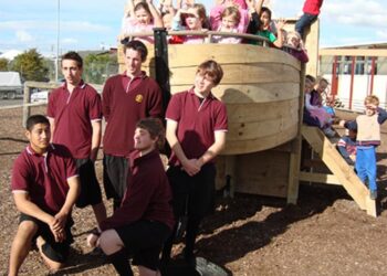 Students on the newly built play equipment