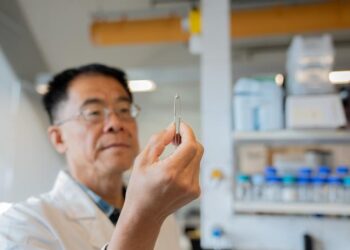 Professor Nei with zinc alloy prototype