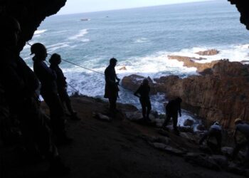 Researchers in cave