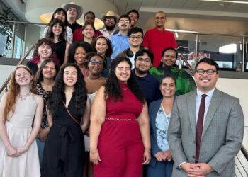 The 2025 University of Texas at Arlington McNair Scholars with director Ricardo Garza, right