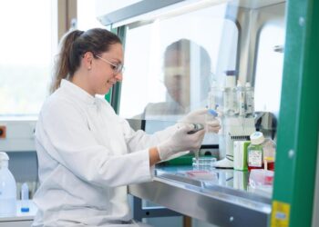 First author Katrin Gradl at work in the cell culture lab
