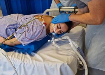 The BathMat inflatable prone repositioning device, being demonstrated with a healthy volunteer