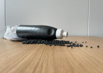 Plastic pellets and bottle of PE