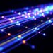 High-Power Pulses Stabilize Light Distribution Across Multicore Fibers