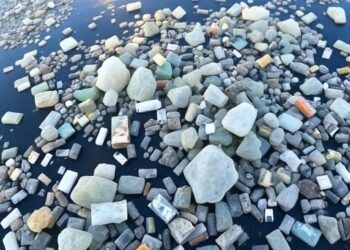Microplastics reach the Arctic through transport, climate feedbacks, and policy gaps