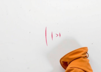 Where Sound Meets Sight: Spatial Coincidence Decides When Attention Fails
