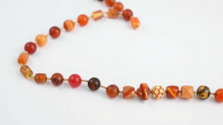 Ancient Carnelian Beads in Thailand Traced to Indian Deccan Traps by Laser Geochemistry