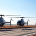 Fuzzy Control Scheme Keeps Fault-Stricken Unmanned Helicopters on Track in Finite Time