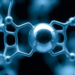 Protons Take Command: NMR Reveals Hidden Gatekeeper in Molecular Sieve Growth