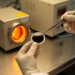 Iron-Rich Perovskite Electrodes Push Symmetric Fuel Cells Into the Intermediate-Temperature Zone
