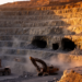 Underground Voids and Staged Excavation Reshape Damage Patterns in a Giant Open-Pit Mine Slope