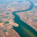 Satellites Reveal a Dying Delta River Being Swallowed by Farms and Cities