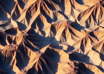 Machines Read 50 Years of Geomorphology Papers and Reveal a Science Reshaped by Climate