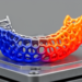 Stress-Feedback Algorithm Reshapes 3D-Printed Jaw Implants Where They Need It Most