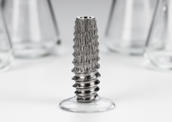 Anodized titania nanotubes turn titanium implants superhydrophilic and corrosion resistant