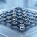 Liquid Metals Offer a Route to Programmable Defects in Two-Dimensional Materials