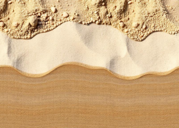 Coarse backfill and centroid densification strengthen coral sand foundations