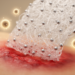 Flame-made nanosilver woven into chitosan fibers fights resistant wound bacteria