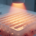 Research report: Near-infrared light-activated collagen-based hydrogel with oriented microchannel structure promoting fibroblast infiltration and inflammatory resolution‌