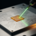 Laser pulses and a phase-change material fix faulty silicon photonic switches with zero static power