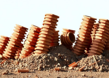 Tilted Piles Defy Their Bad Reputation by Stiffening Group Foundations Under Strong Shaking