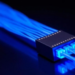 Programmable Photonic Chip Tames Modal Dispersion in Record-Breaking Fiber Transmission