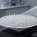 Inverse-Designed Metamaterial Lens Steers Beams Across Wide Bandwidths in Minutes