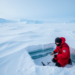 Antarctic Snowfall’s Hidden History: Winds and Meltwater Explain Why Models Overpredict a Warming-Driven Gain