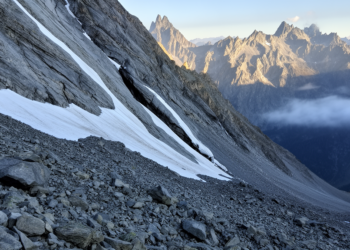 Vanishing Ice Aprons Pushed an Alpine Rock Slope to the Brink of Collapse