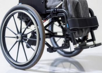 Smart Wheelchair Control System Recovers From Extreme Tilts by Switching Between Two Controllers